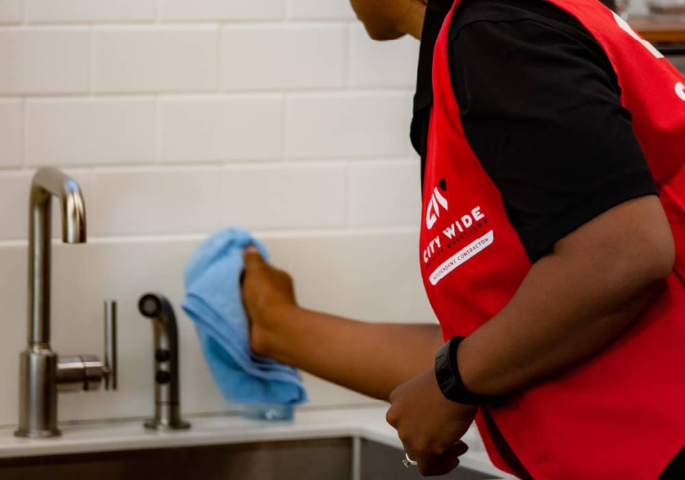 restroom attendant cleaning